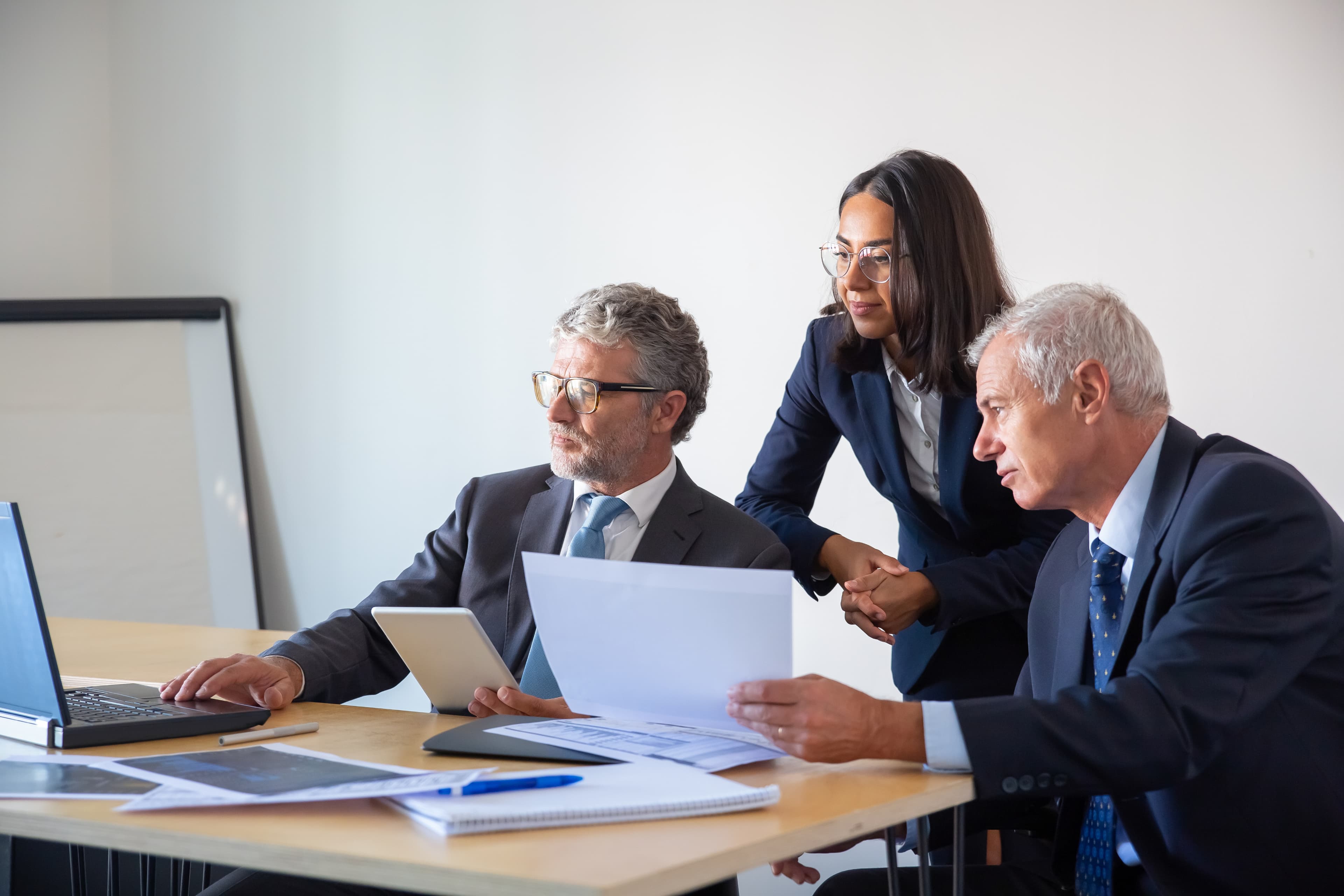 Executives reviewing documents